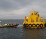 Deployment of EMEC test support buoy at scale tidal site (Image: Mike Brookes-Roper)
