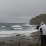 Cameraman for BBC Breakfast News filming waves at Billia Croo, EMEC's wave test site