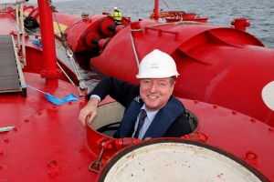 ICE president Richard Coakley emerging from a Pelamis Wave Power P2 device at Lyness, Orkney (Image: Orkney Photographic)