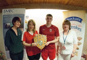 Pictured are sponsor representatives from EMEC (Lisa MacKenzie, left) and Tods of Orkney (Susan Marwick, right) with captains of the winning team, Ingrid Kerr and Ross Manson.