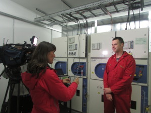 Jenny Hill interviewing Bryan Rendall in the EMEC substation at Billia Croo