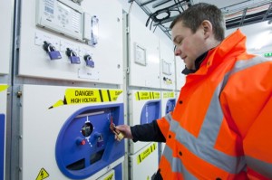 EMEC Electrical and Test Engineer working on switch gear inside the Billia Croo substation (Image Global Warming Images)