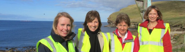 EMEC's Eileen Linklater with Lena Wilson, Maggie McGinlay and Seonaid Vass at Billia Croo - can you spot the Pelamis P2 device in the background?