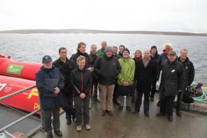 Delegates touring the Pelamis P2 device at Lyness marine renewables port (Credit: Orkney Photographic)