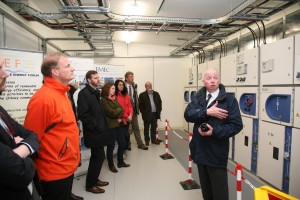 Rémi and Sian enjoying a tour from Neil Kermode of the EMEC substation at Billia Croo as part of the Orkney Ocean Energy Day, June 2014 (Credit Orkney Photographic)