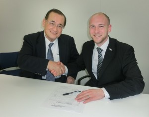 Oliver Wragg signing up to the association with Sakai san, Chairman of the Cluster and President of Kyowakiden Industry Company in Nagasaki, Japan, March 2015
