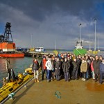 Orkney Day Trip delegates at Hatston Pier with Scotrenewables SR250 tidal turbine (Credit: Colin Keldie)