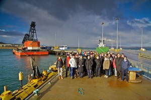Orkney Day Trip delegates at Hatston Pier with Scotrenewables SR250 tidal turbine (Credit: Colin Keldie)