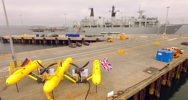 PLATO tidal energy system incorporating SCHOTTEL Instream Turbines (SIT) on Hatston Pier, HMS Bulwark in the background (Credit SME)