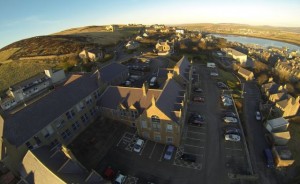 Aerial of the Old Academy Building (foreground) and Old Stromness Primary School (background) which will form part of the new renewables campus (Credit Sula Diving)