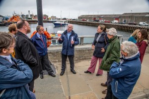 Neil Kermode discusses ocean energy with Anne-Marie Trevelyan MP and David Duguid MP (Credit Colin Keldie)