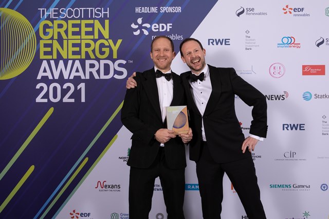 Matthew Finn and Rob Flynn accepting Champion of Renewables award