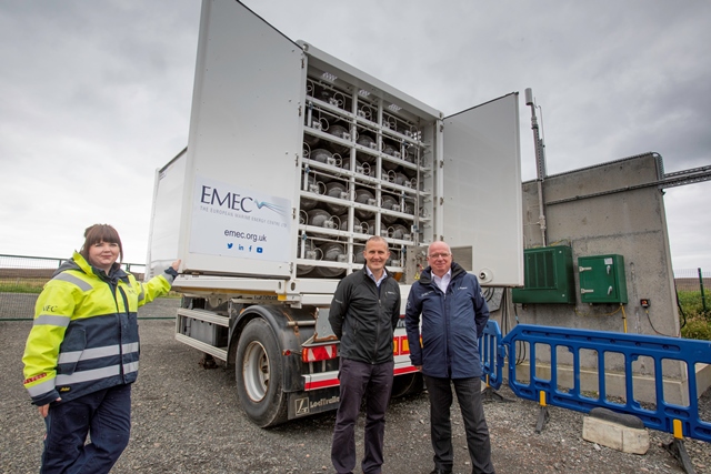 Net Zero & Energy Secretary Michael Matheson at EMEC site on Eday with hydrogen transport trailer (credit EMEC)